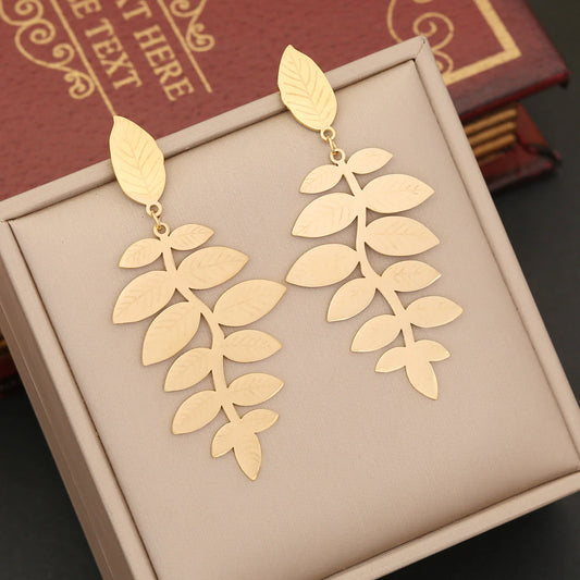 Pendientes de botón, acero inoxidable diseño de hoja