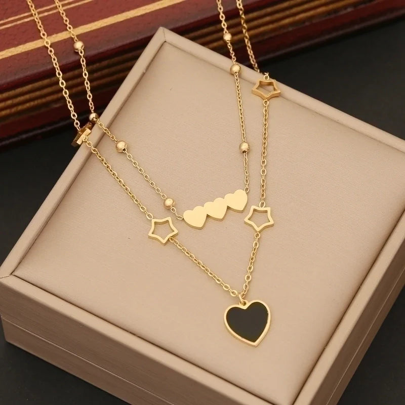 Colgante acero inoxidable con corazones y estrellas